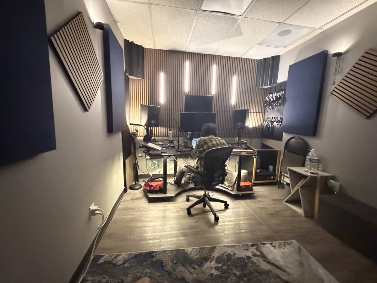 Engineer at the desk in the AMPED UP AUDIO control room
